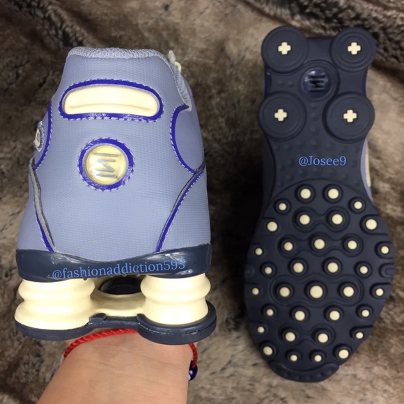 purple and white nike shox